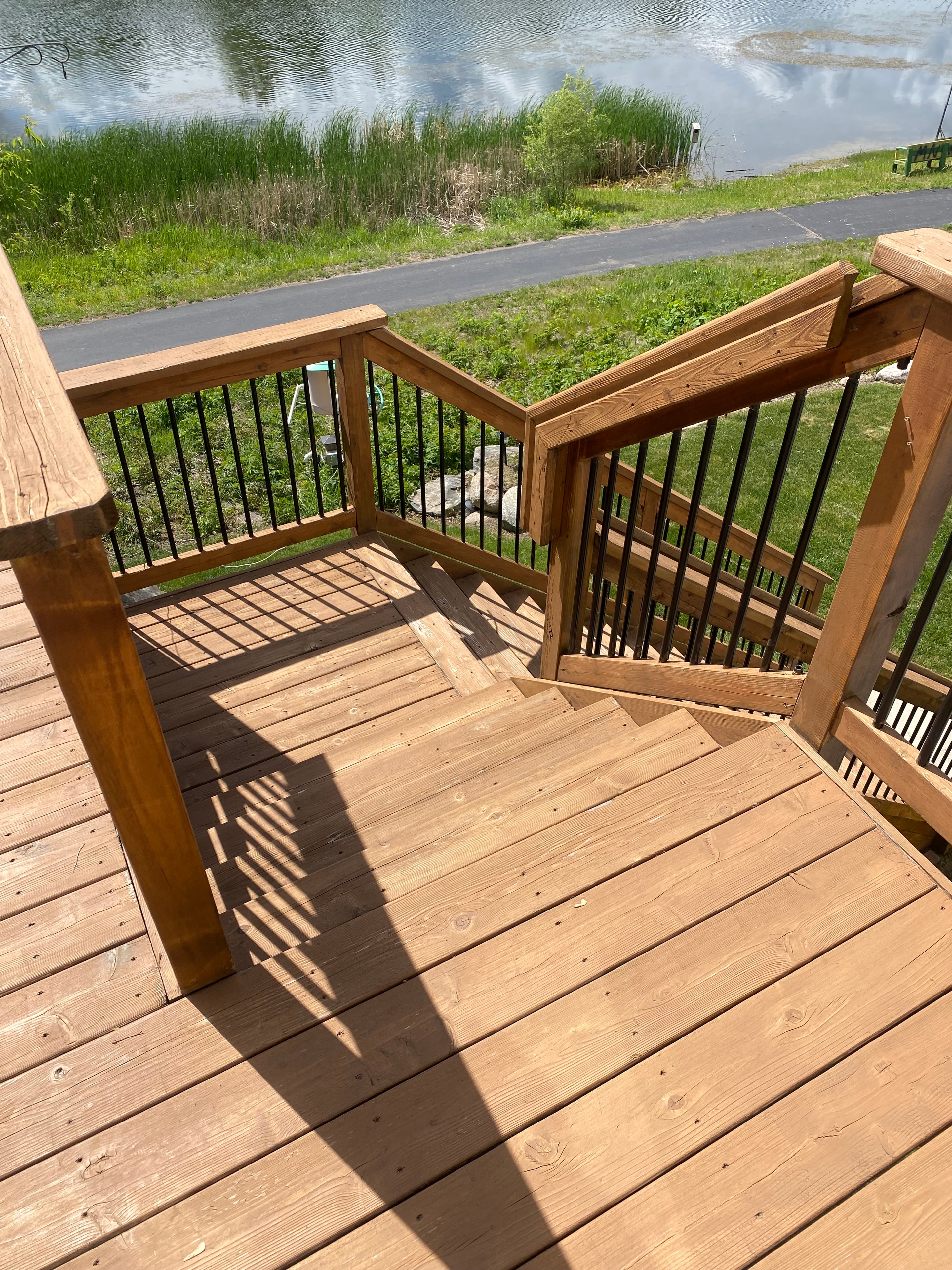 Lakeside Composite Deck — composite deck surface and pergola framing detail